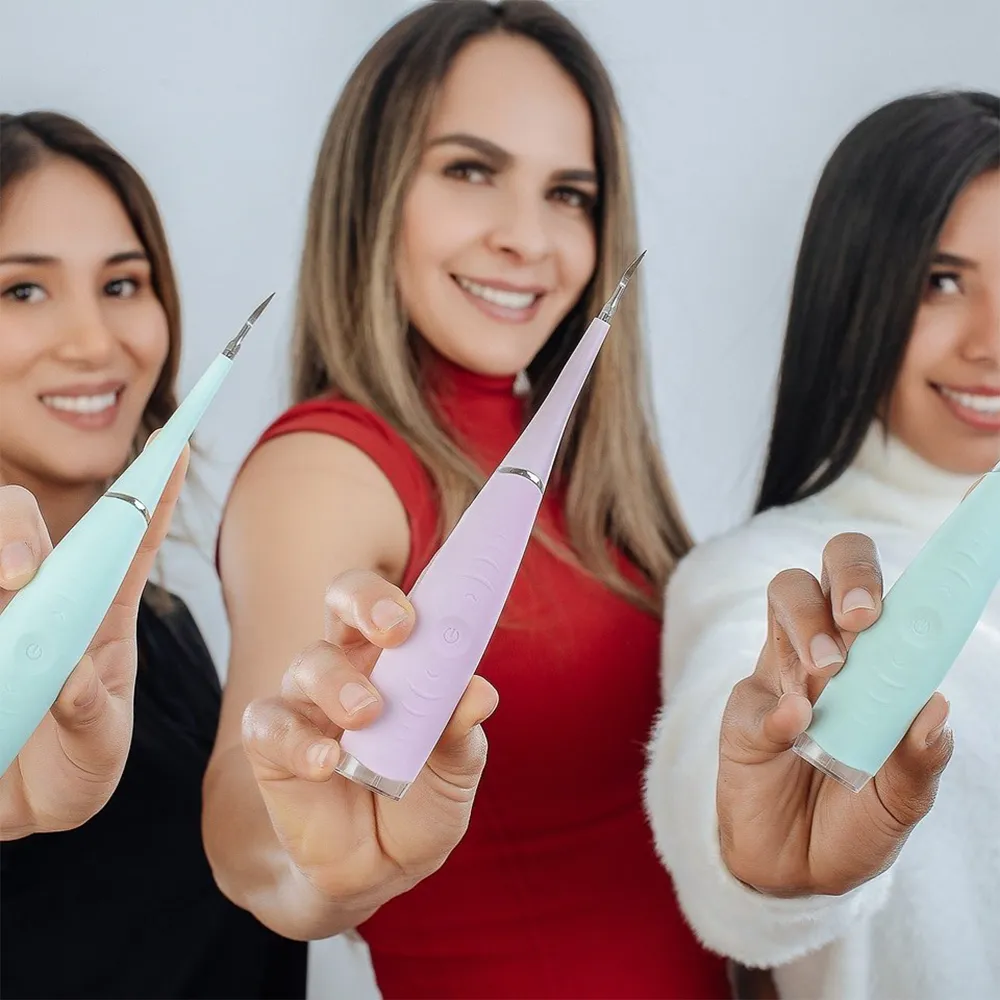 detartreur-dentaire-dentica-a-ultrasons-enleve-le-tartre-tenu-par-3-filles